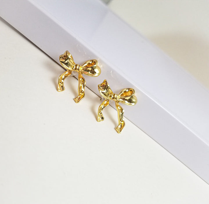 GOLDEN BOW EARRING (STAINLESS STEEL)