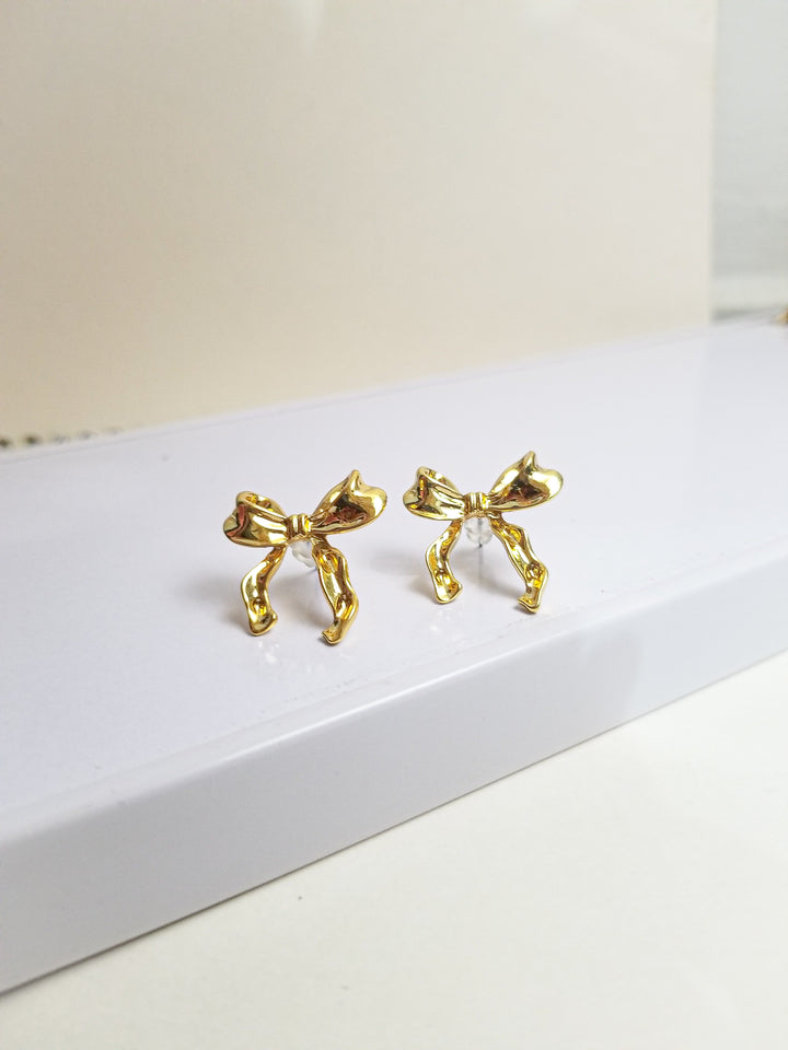 GOLDEN BOW EARRING (STAINLESS STEEL)